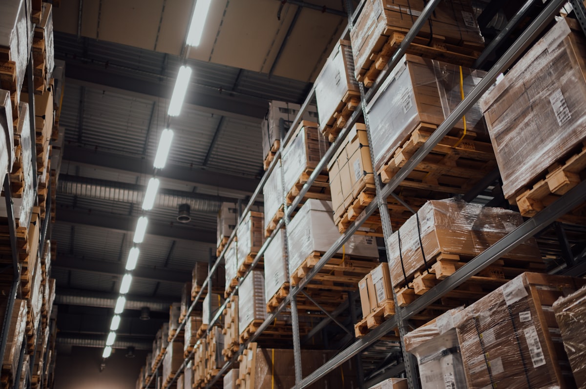 Used selective pallet racking loaded with product in a working warehouse